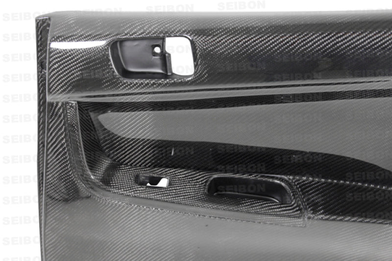 Seibon 08-12 Mitsubishi Evo Carbon Fiber Rear Door Panels